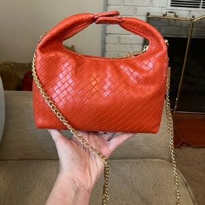 Orange woven purse with gold chain